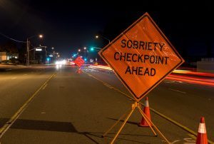 Sobriety checkpoint ahead sign