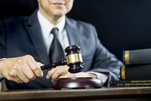 Judge hitting a gavel